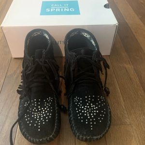 Black fringe high stop moccasin booties